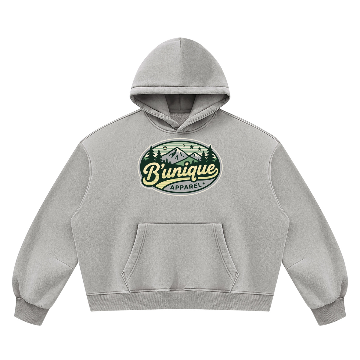 Grey boxy-fit ODMPOD Unisex UNIQUE MOUTAIN Vintage Wash Boxy Fleece Hoodie with a front kangaroo pocket and a graphic of mountains and trees above the text Bunique APPAREL.