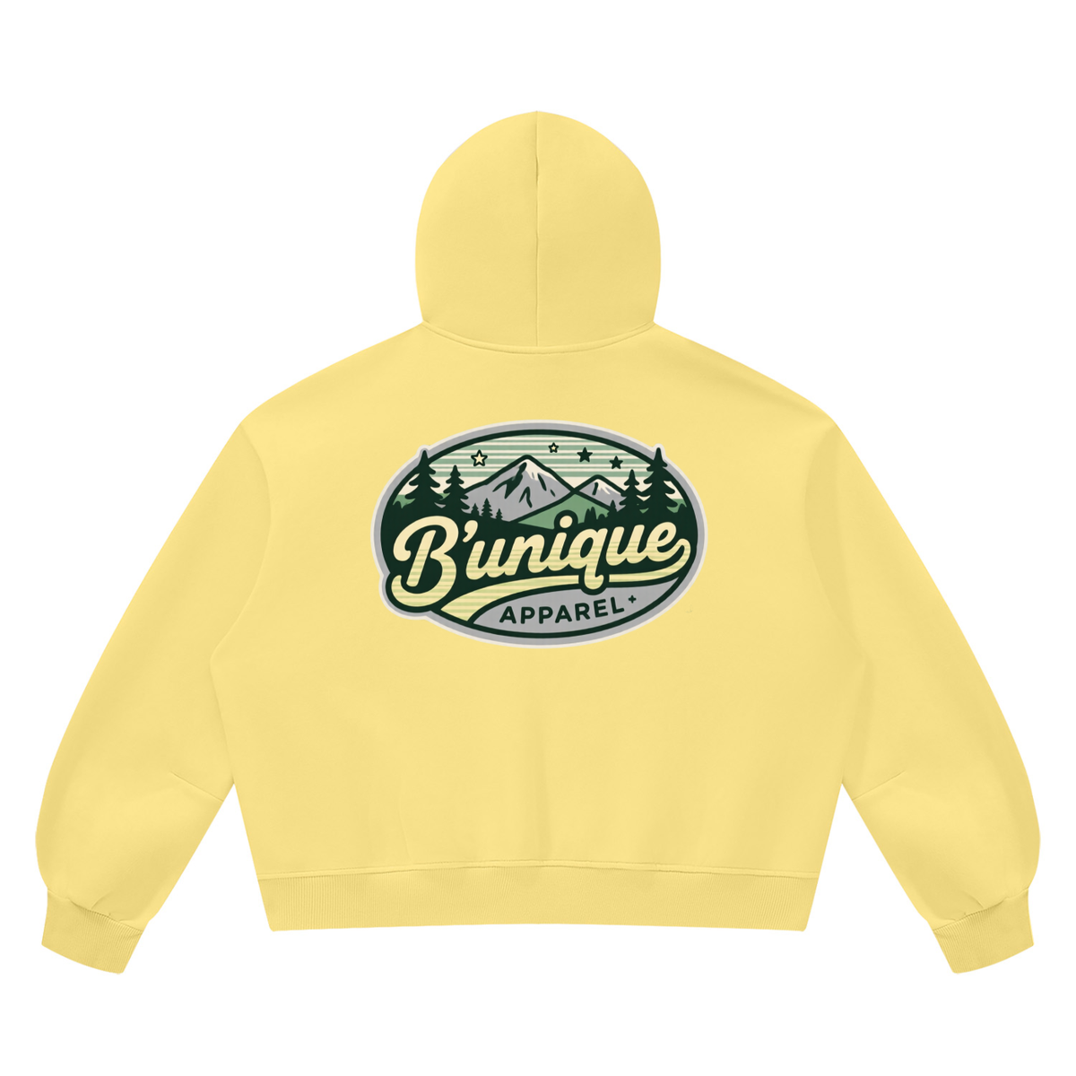 Light yellow Unisex UNIQUE MOUTAIN Vintage Wash Boxy Fleece Hoodie featuring a graphic on the back of mountains and pine trees inside an oval frame with the text Bunique Apparel.